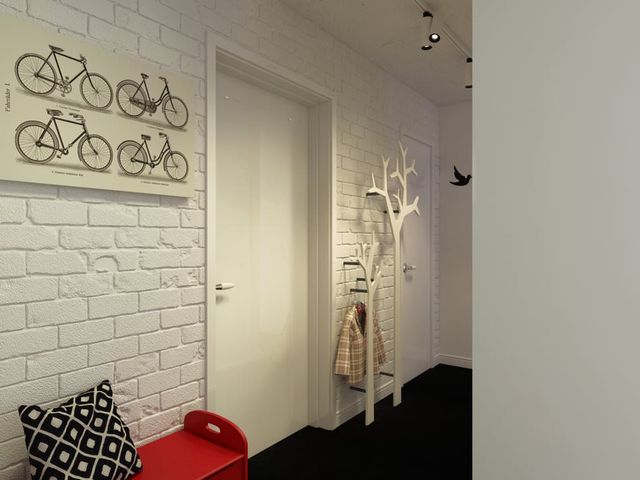 Белая кирпичная стена в интерьере гостиной в фото